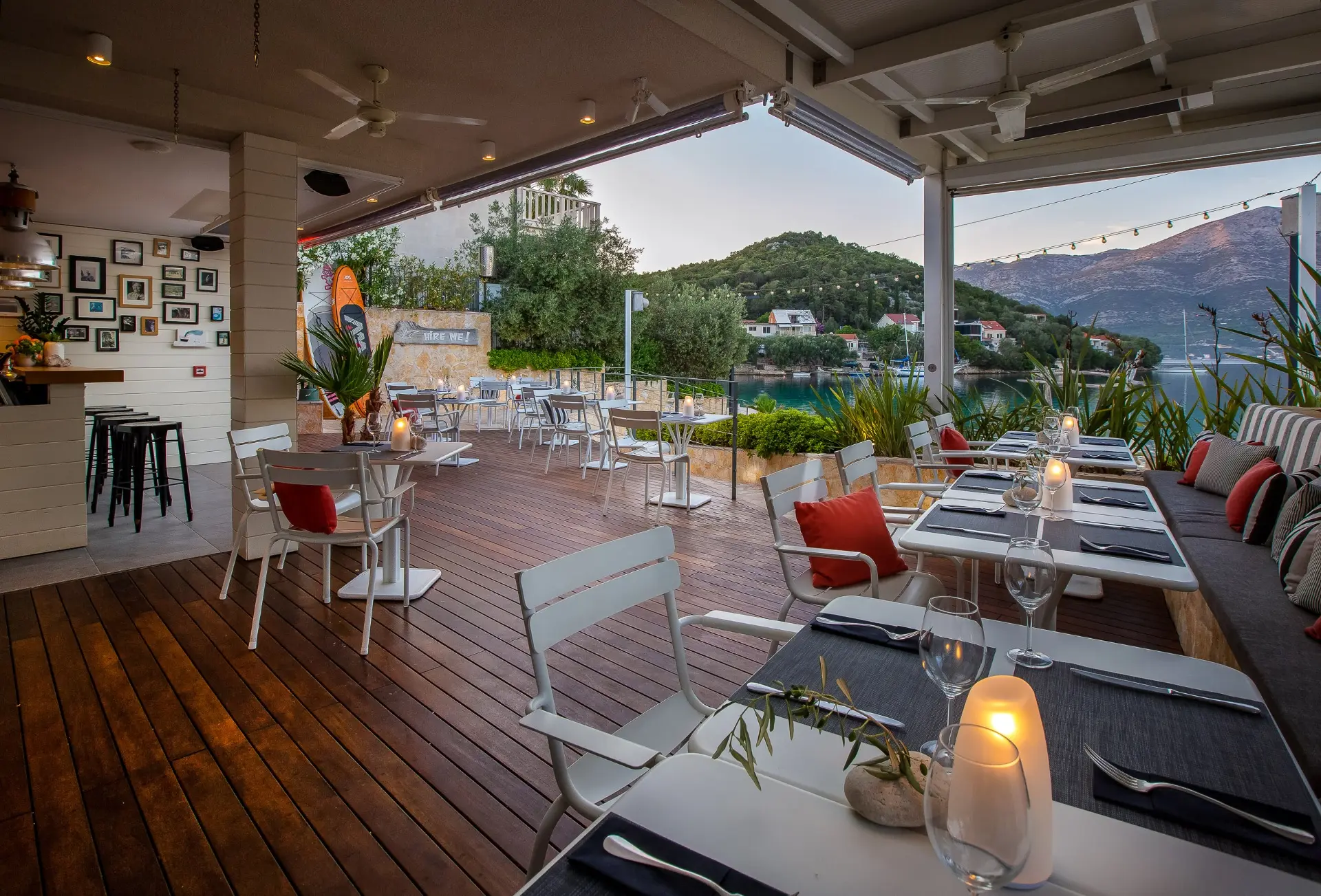 Mimi's Bistro terrace at golden hour overlooking the Adriatic